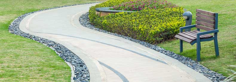 This image shows a walkway that has a decorative concrete paint on it.