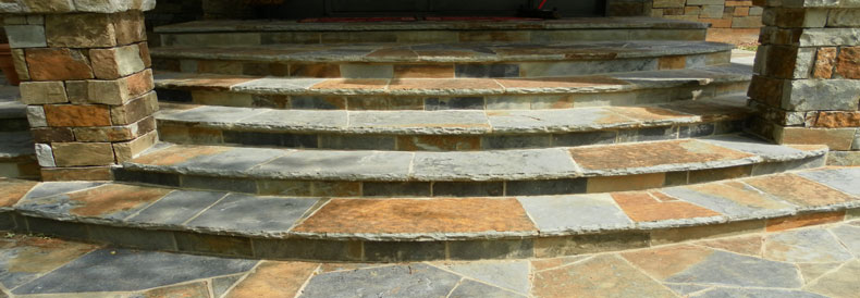 This image shows a stairs made up of pavers.