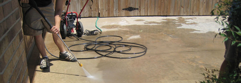 This image shows man power spraying the floor.