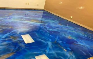 This image shows a blue metallic epoxy floor.